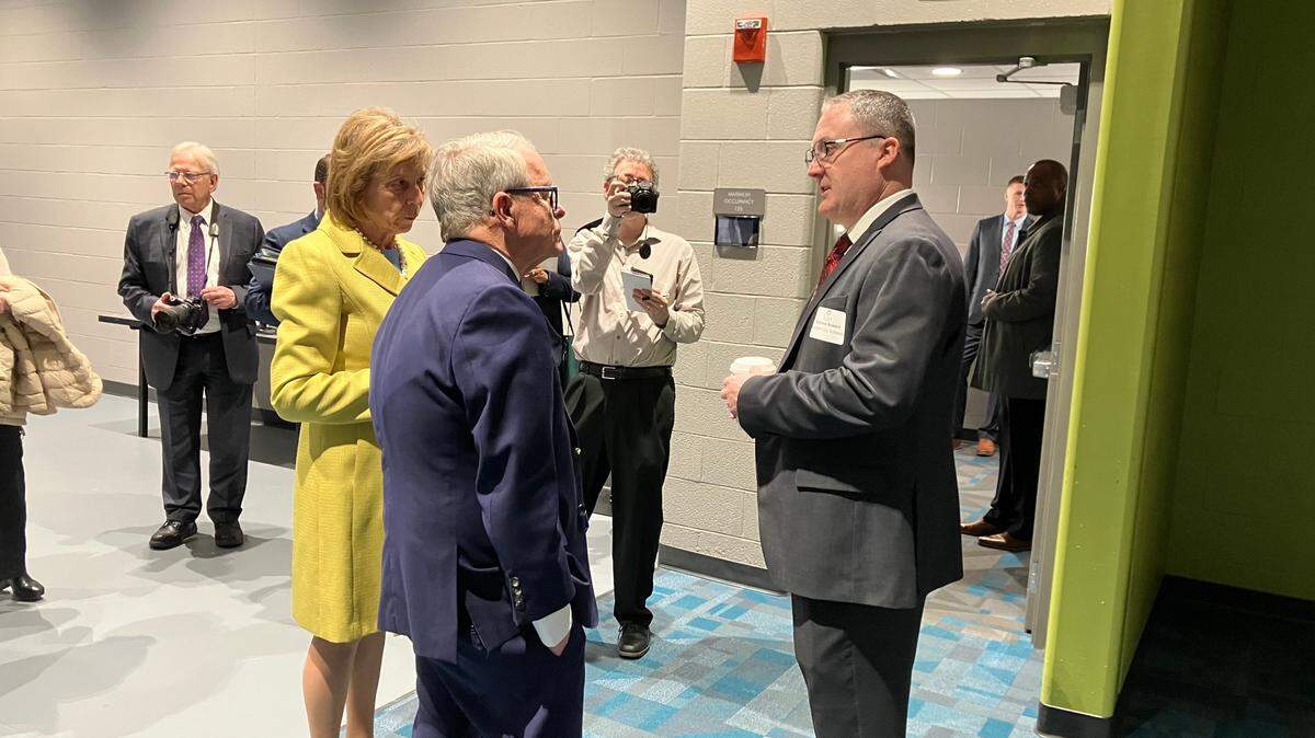Ohio Gov. Mike DeWine and Ohio First Lady Fran DeWine talk with Campbell City School District Superintendent Matt Bowen on Friday