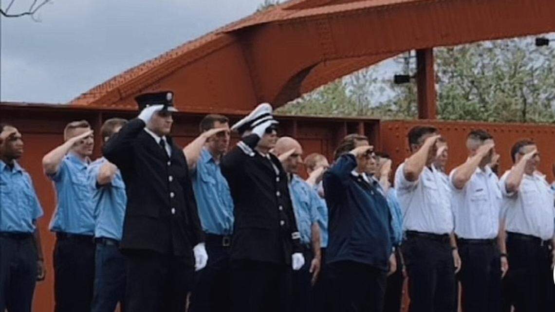 Youngstown firefighters met on the Spring Commons Bridge across from the fire station to honor their fallen colleagues.