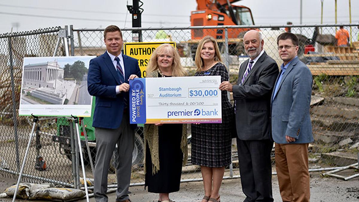 Stambaugh Auditorium received a $30,000 grant from the Premier Bank Foundation. From left are Josh Toot, senior vice president of commercial banking at Premier Bank; JoAnn Stock, chief development officer of Stambaugh Auditorium; Mindy Wiesenee, assistant vice president, branch manager at Premier Bank; Frank Hierro, Mahoning Valley market president at Premier Bank; and Matt Pagac, chief executive and operating officer of Stambaugh Auditorium. (Contributed photo)