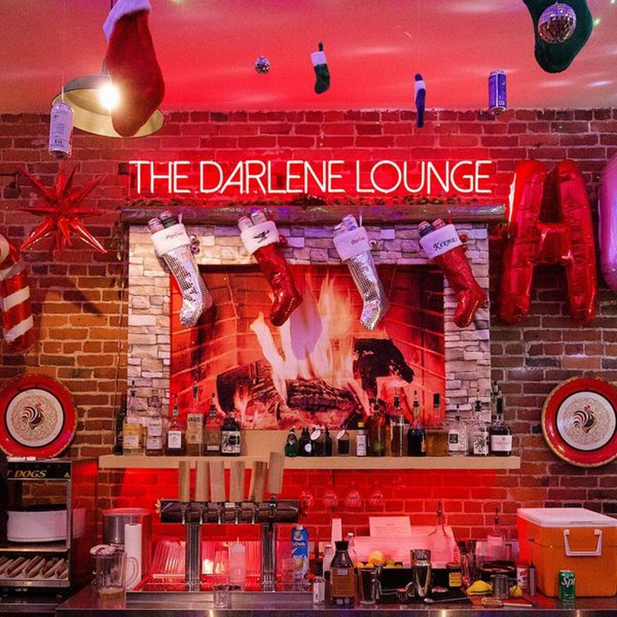 Make reservations online for A Modern Method Christmas to see the Darlene Lounge covered in vintage-inspired holiday decor.