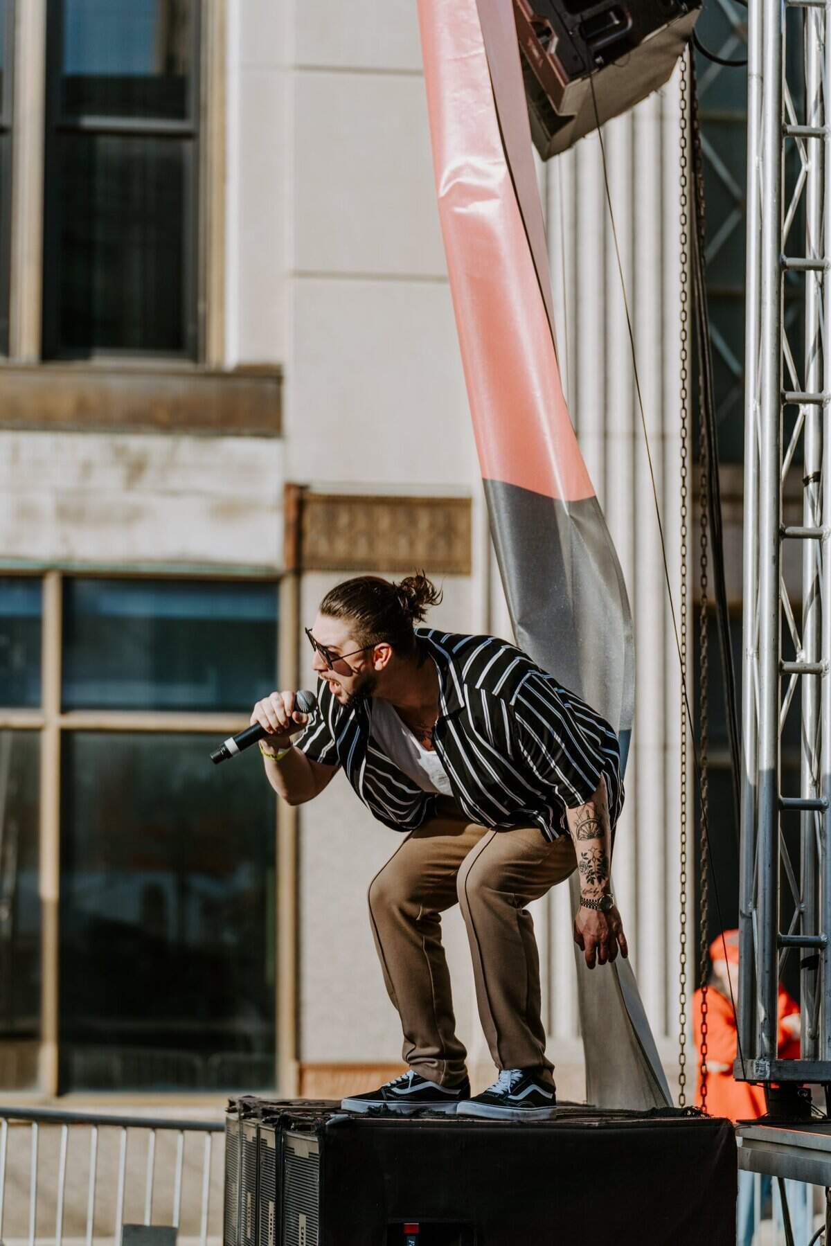 Lou Rivera, lead singer of Fifth and Aurora, performing at 2022 Federal Frenzy