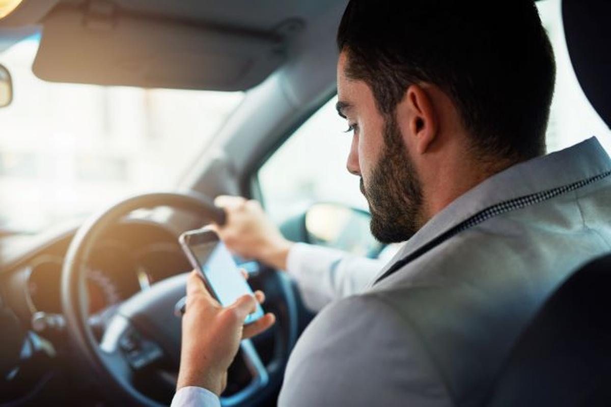 Can you legally text at a red light in California?&nbsp;
