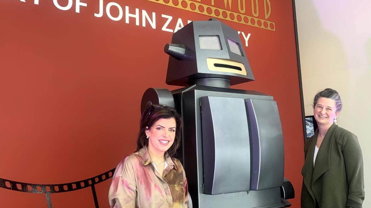 Katelyn Amendolara-Russo, director of the Medici Museum of Art, and Meghan Reed, director of the Trumbull County Historical Society at the John Zabrucky art exhibit.