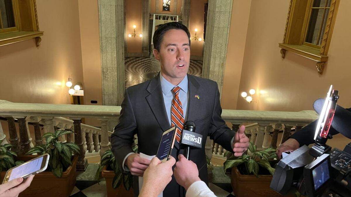 Ohio Secretary of State Frank LaRose talks to reporters.