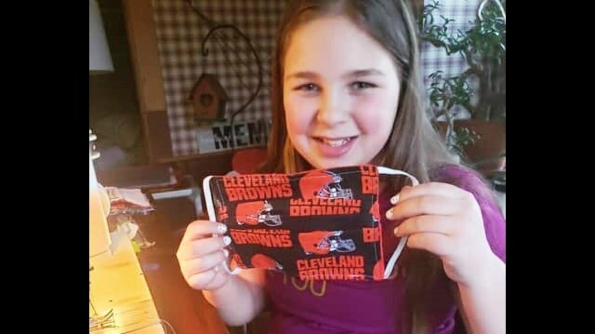 Zoie Luzadder, a John F. Kennedy Catholic School fourth-grader, received a Kindness Badge for making masks for the medical community. (Contributed photo)