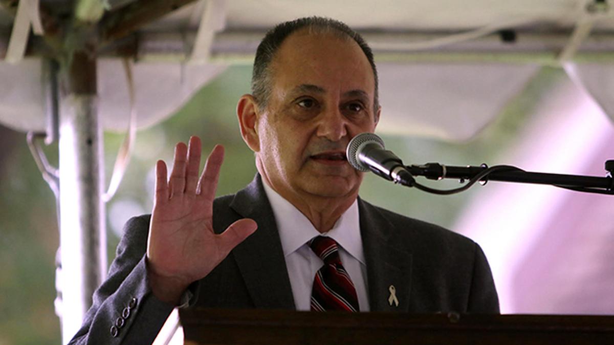 Duane Piccirilli, executive director of the Mahoning County Mental Health and Recovery Board, addresses those gathered for a ribbon-cutting and the Mahoning Valley Campus of Care in Mineral Ridge on Oct. 2, 2020. (Photo by Robert K. Yosay)