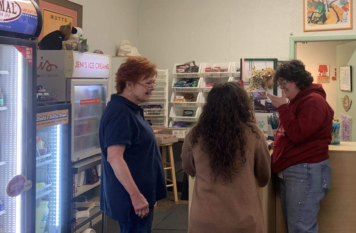 Linda Yost (left) offers holistic pet nutrition, raw diets, intolerance kits and natural supplements at Pets Are People Too, located at 137 North St. NW in Warren.