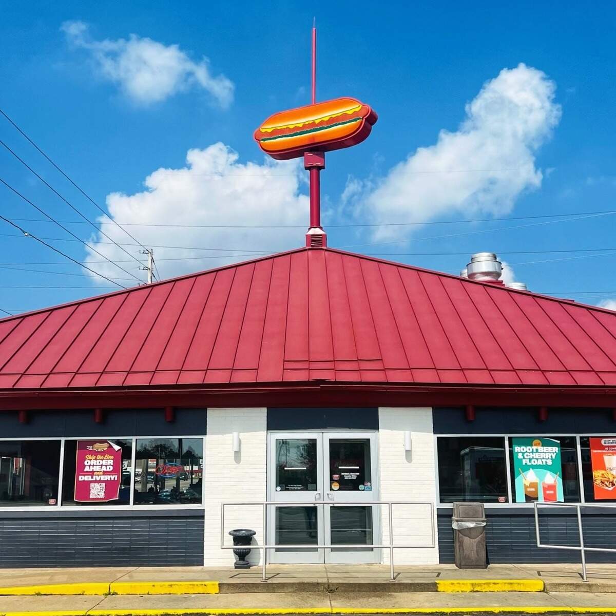 The Hot Dog Shoppe in Warren celebrates 80 years with $1 chili dogs, a restored landmark spinning sign, and honors for employees at 740 West Market St.