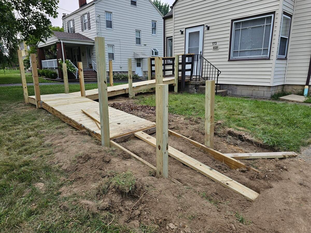 Habitat for Humanity of Mahoning Valley volunteers rebuild Susan Gadzia’s ramp on front porch