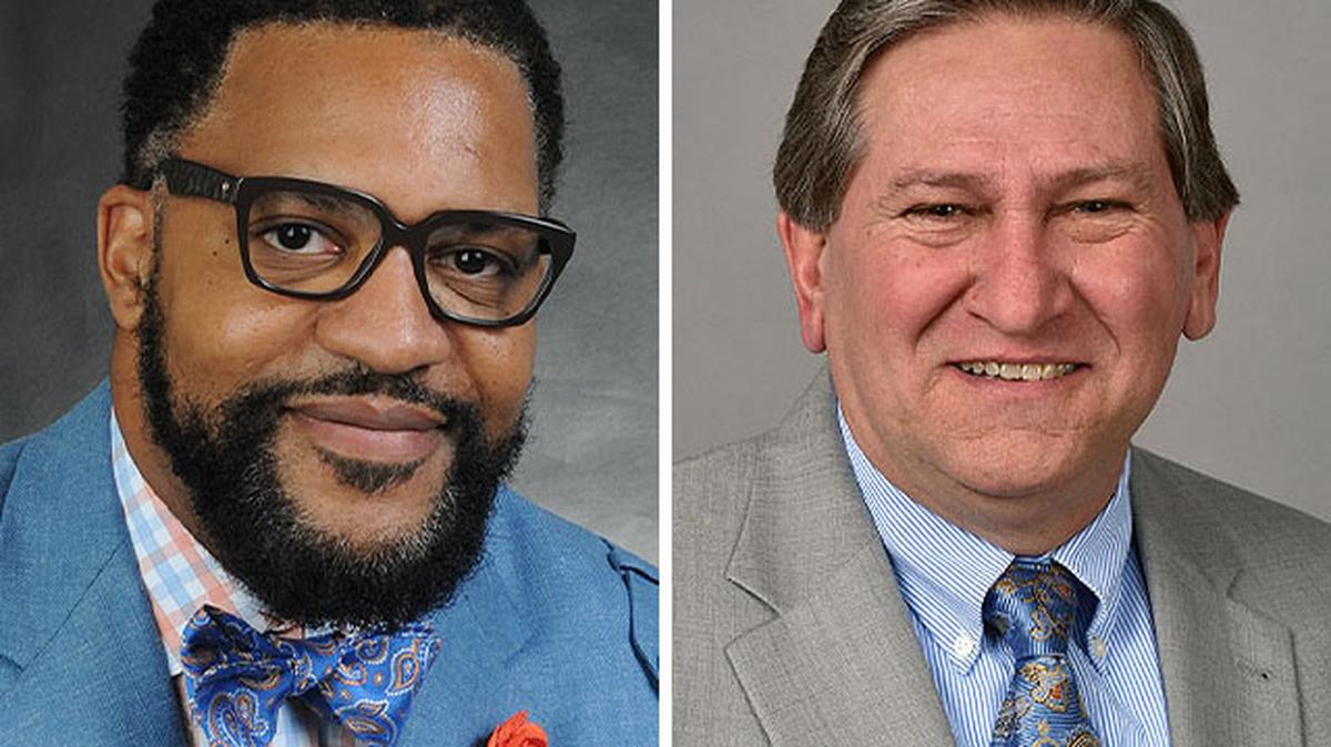 Justin Jennings, Youngstown City School District CEO, left, and Mike Stanko, Mahoning County Career and Technical Center board president.