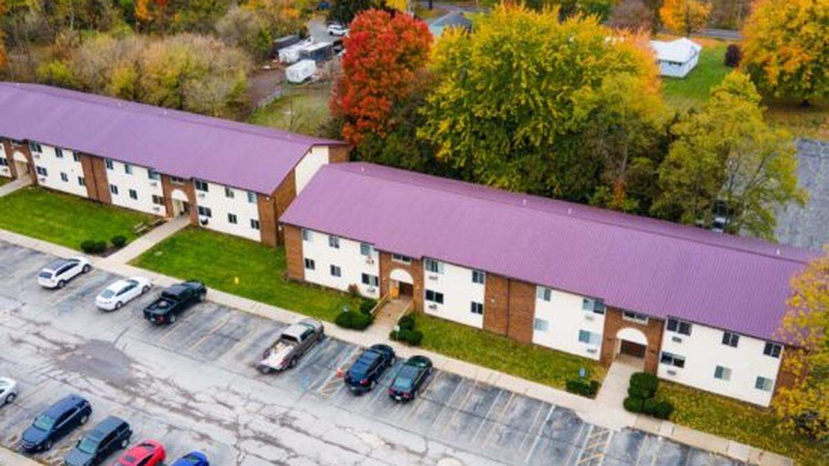 There’s a 48-unit, two-story complex for sale in Cortland on 14 acres for $4.2M with remodeled units, on-site laundry, basketball court and nearby manufacturing hubs.