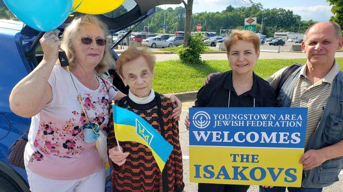 From left to right: Zina Lerman of Youngstown welcomed her relatives Klara Isakova, 85; Iryna Isakova, 60; and Sergey Isakova, 60, to the United States on Tuesday, June 14, 2022, at Pittsburgh International Airport.