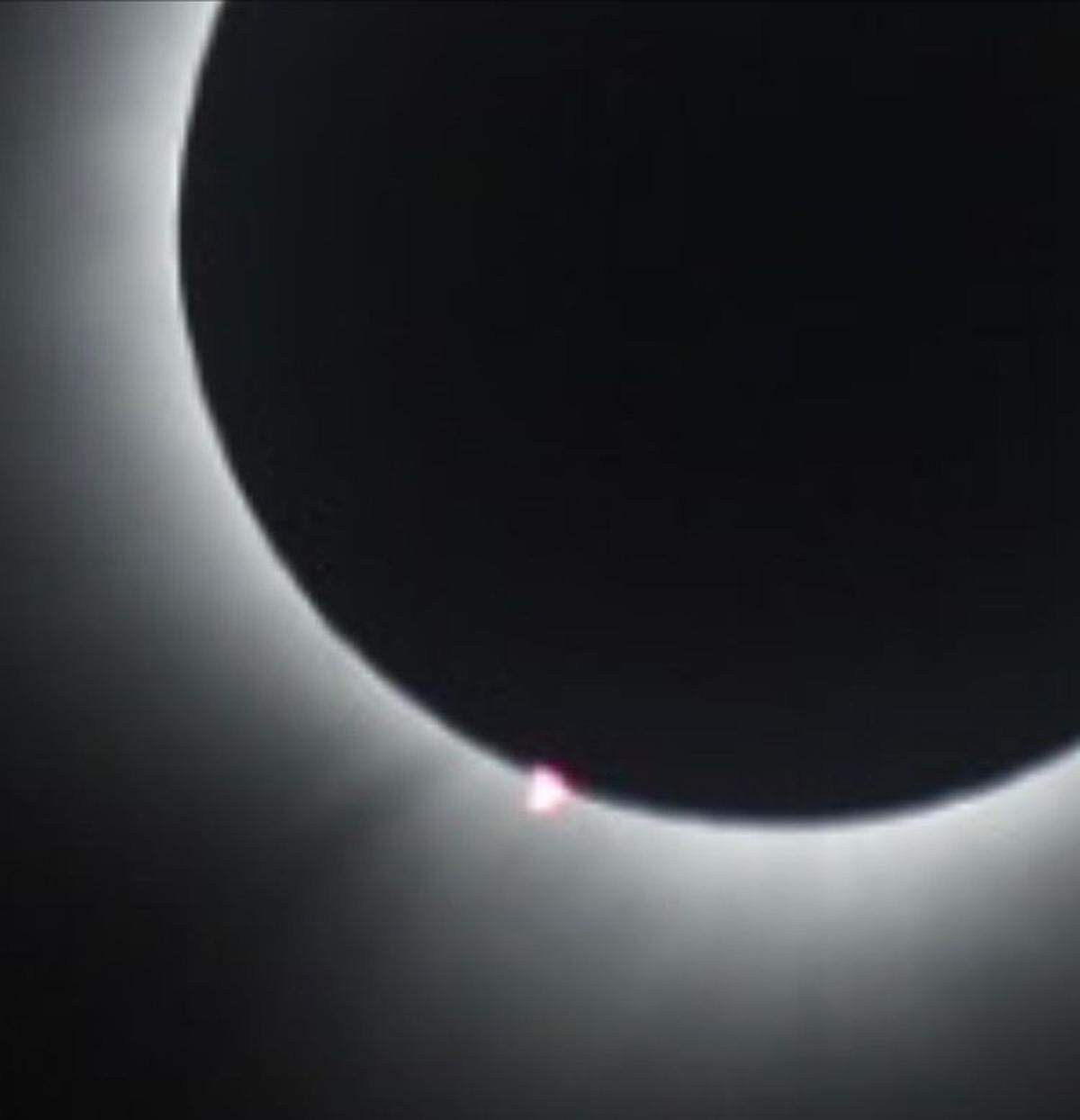 This is a solar flare shown in the bottom left of this eclipse photo taken Monday by Eric Brown at a farm property south of Norwalk, Ohio.