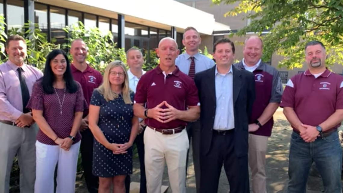 Boardman Local Schools leaders surround superintendent Tim Saxton as he announces a mask mandate on YouTube. 