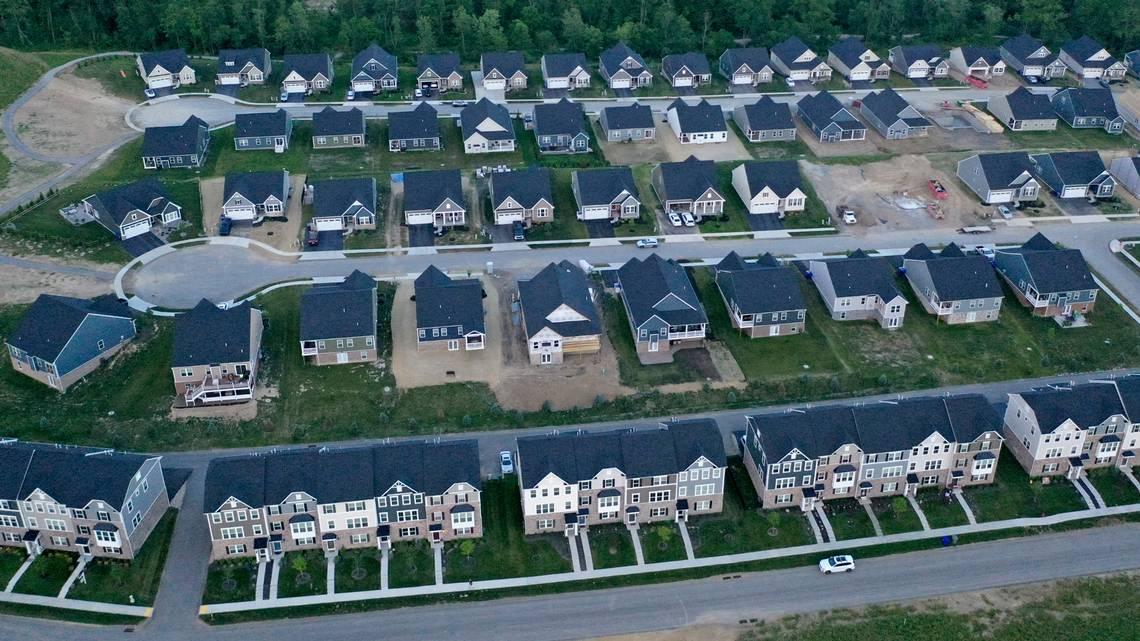 A photo shows a new home development in Valencia, Pennsylvania, on June 29. Lumber prices have continued falling but experts say it could take time for the decrease to translate to builders’ costs. (AP Photo/Gene J. Puskar) GENE J. PUSKAR AP