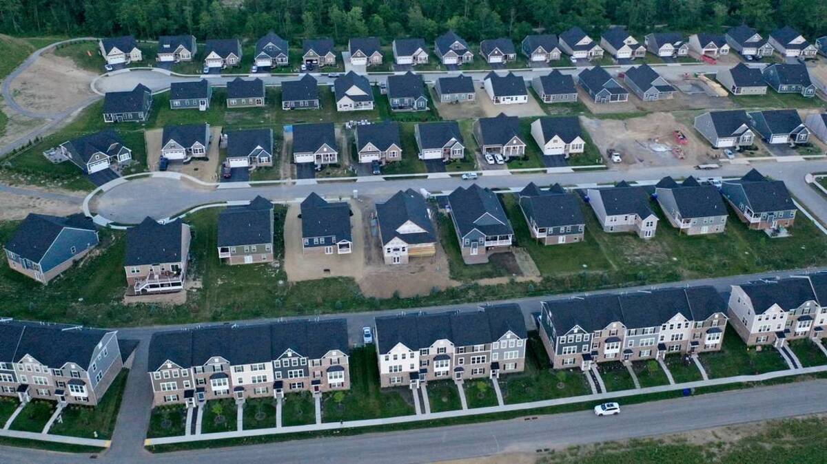 A photo shows a new home development in Valencia, Pennsylvania, on June 29. Lumber prices have continued falling but experts say it could take time for the decrease to translate to builders’ costs. (AP Photo/Gene J. Puskar) GENE J. PUSKAR AP