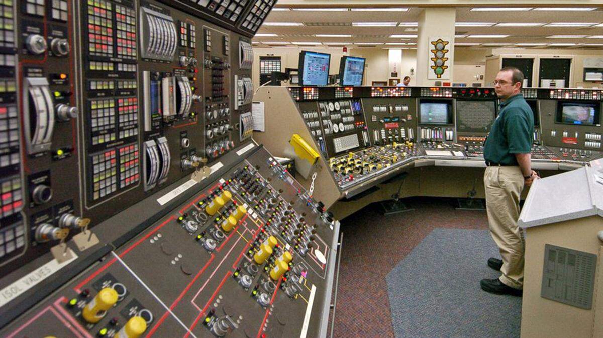 FILE – In this April 12, 2005, file photo, operator Kevin Holko monitors the control room during a scheduled refueling shutdown at the Perry Nuclear Power Plant in North Perry, Ohio.