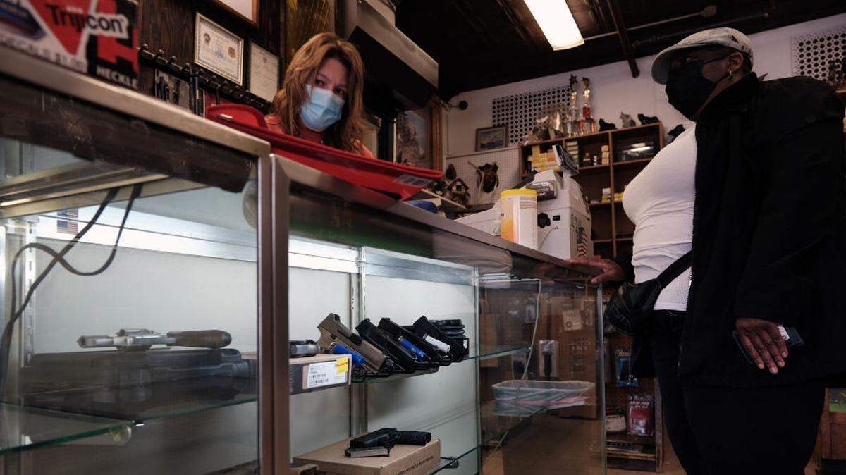 Lisa Caso sells guns at Caso’s Gun-A-Rama store on March 25, 2021 in Jersey City, New Jersey. Caso’s Gun-A-Rama has had a significant increase in business with lines often out the door as more people buy guns for security and for fear that there will be increased bans on them. In the wake of recent mass shootings, the Biden administration is pushing for the Senate to pass gun legislation already passed by the House. Area gun businesses have seen a rise in sales recently that has even led to a shortage of bullets.