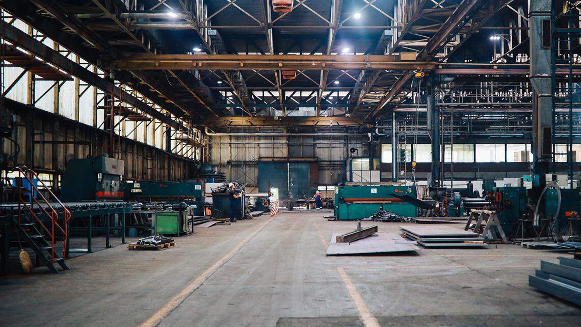 Large empty industrial warehouse space.