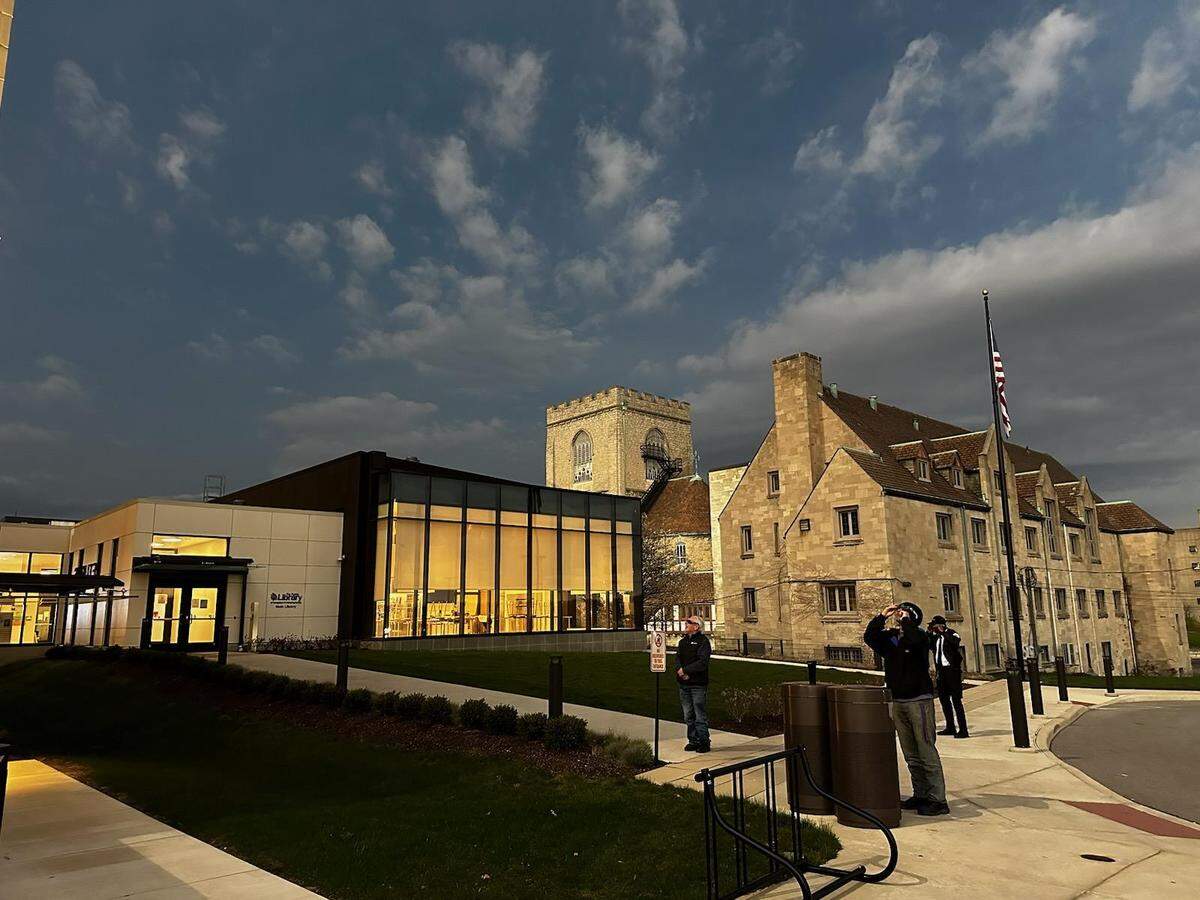 Youngstown and Mahoning County Library is shown during the solar eclipse on Monday.