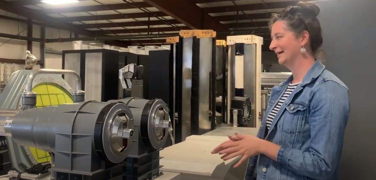 Meghan Reed showing a major highlight of the museum, “the most important device in the universe,” which was made by Modern Props and featured in 100 films and TV series, like Austin Powers and Star Trek.