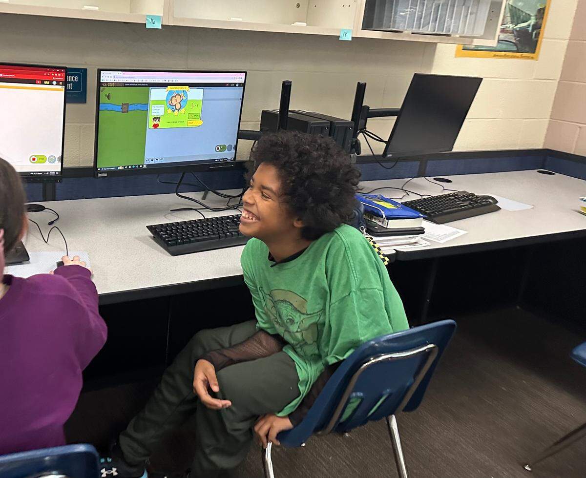 Sebring 7th-grader Quincy Taylor enjoys playing coding games with his classmates as part of the “Hour of Code” event.