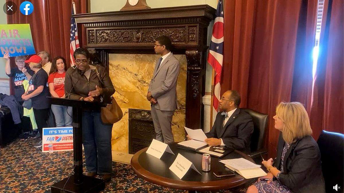 In this image captured from a Facebook Live video, state Sen. Vernon Sykes and Ohio House Democratic Leader Allison Russo, at right, listen to an Ohioan comment on the redistricting process during a public forum the state lawmakers held Thursday.