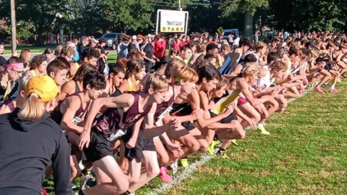Hundreds of runners race out at the start of Saturday’s annual Boardman Spartan Invitational on the grounds of Boardman High School. The meet is one of the largest regular-season invitational meets in Ohio.