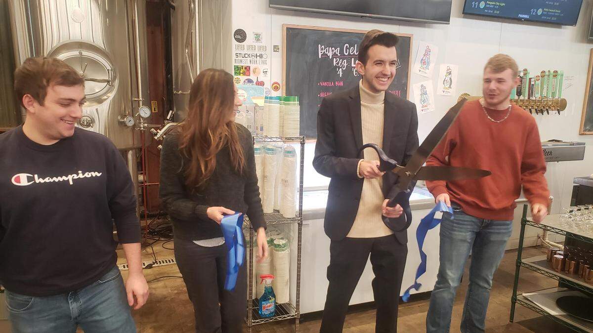 Alexander Papa opened the Papa Gelateria location Wednesday alongside Penguin City Beer part-owner Aspasia Lyras-Bernacki and the Youngstown/Warren Regional Chamber.