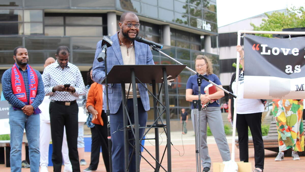 Hundreds gathered in Springfield to support Haitians after the Supreme Court allowed ending TPS, urging preparedness, legal help, and launching food and diaper drives.