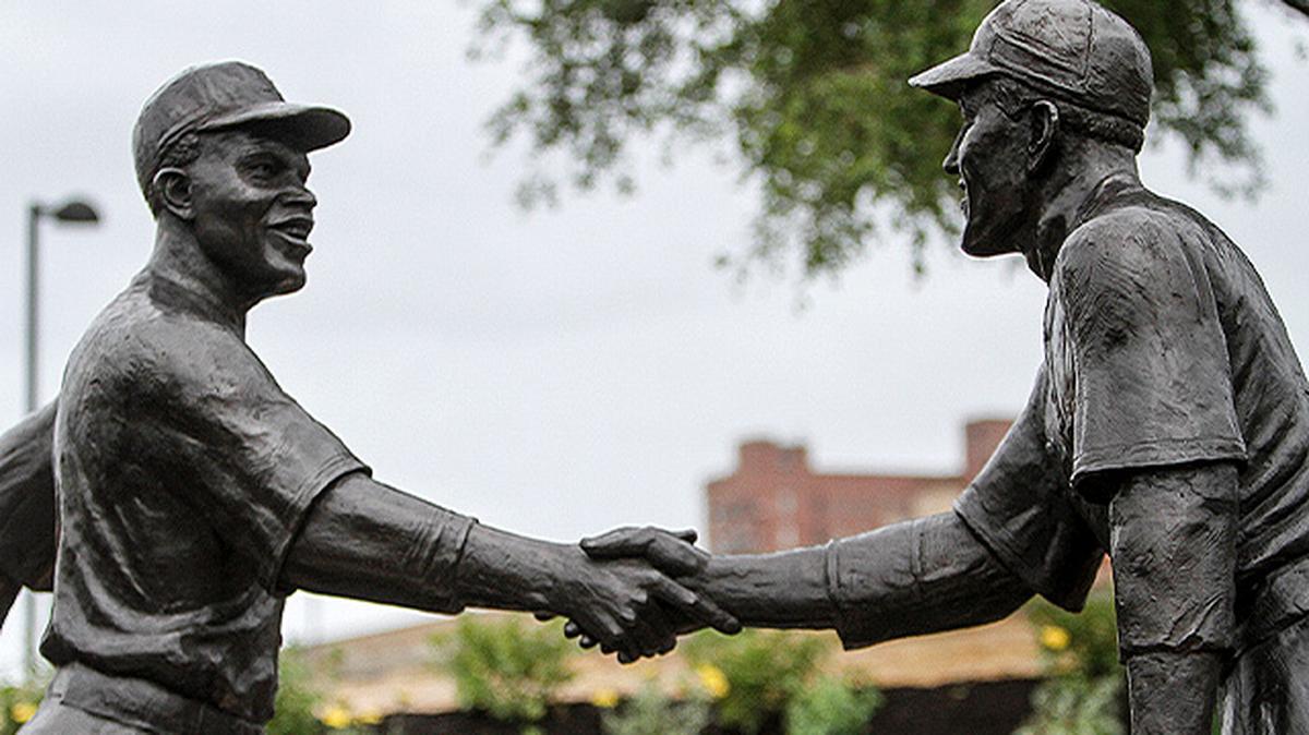 The Shuba-Robinson Commemorative Statue was unveiled Saturday in Wean Park in Youngstown. The statue commemorates the handshake between Jackie Robinson and Youngstown native George Shuba after Robinson, a veteran of the Negro Leagues, hit his first home run in 1946 when they were teammates with the Montreal Royals of the International League. (Robert K. Yosay | Mahoning Matters)