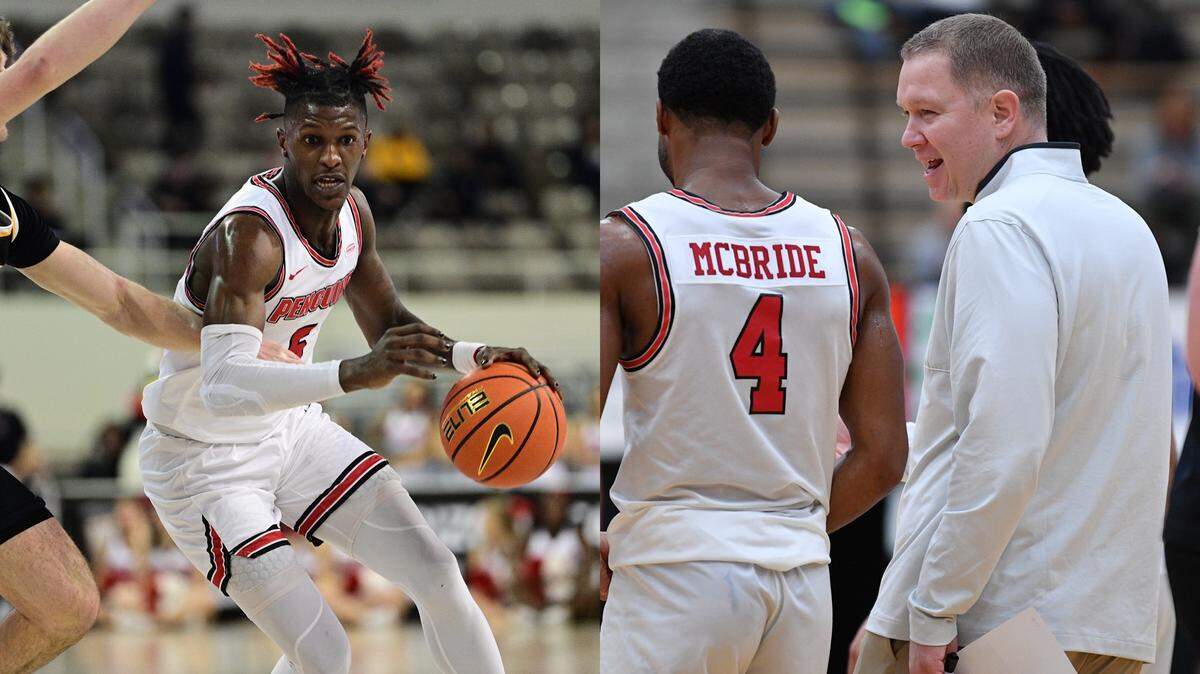 From left, Youngstown State’s Jerrod Calhoun and Dwayne Cohill