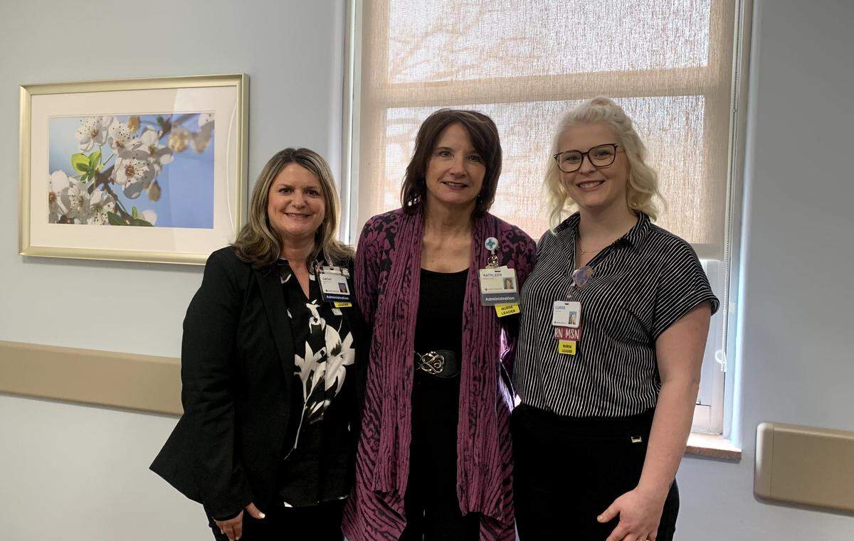 (left ro right) Manager Cathy Ronci, CEO at St. Elizabeth Hospital in Youngstown Kathy Harley and RN Corrie Archer in one of the 17 newly-opened treatment rooms at the hospital.
