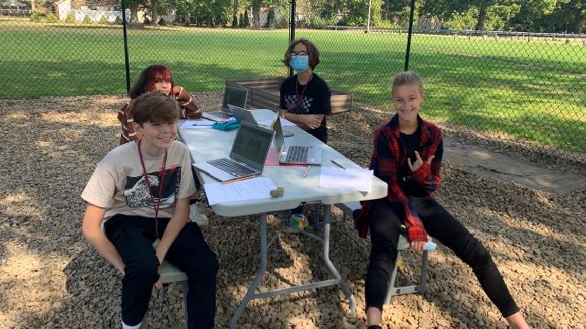 Seventh-grade students use Glenwood Junior High School’s new outdoor learning space. (Contributed photo)