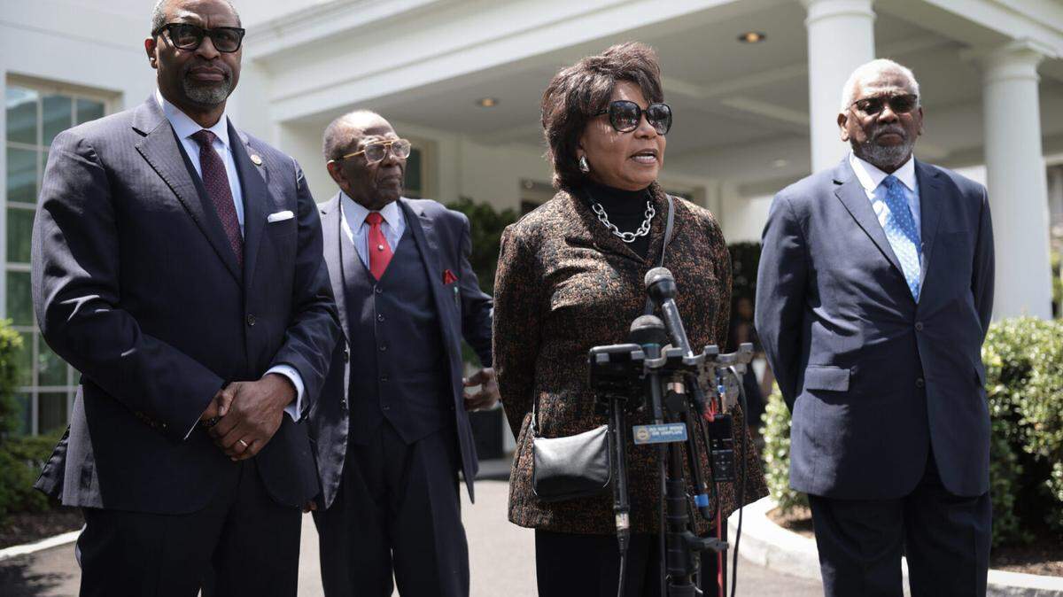 WASHINGTON, DC - MAY 16: Plaintiffs and family members of plaintiffs in the Brown v. Board of Education Supreme Court case Cheryl Brown Henderson (2nd R), John Stokes (2nd L) and Nathaniel Briggs (R) speaks outside the White House with NAACP President Derrick Johnson (L) after meeting with U.S. President Joe Biden on May 16, 2024 in Washington, DC. This week marks the 70th anniversary of the landmark case that ended the segregation of students based on race in the United States.