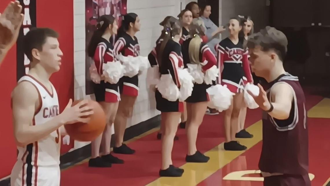 Canfield’s Drew Shapiro, left, prepares to inbound the ball as Boardman’s Kaden Mayhew, right, defends during Tuesday night’s varsity boys’ basketball game in the Cardinals’ gym.