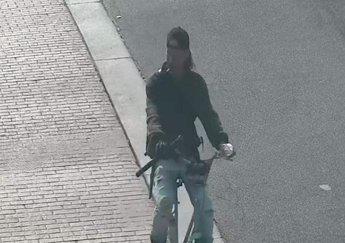 Surveillance video captured unknown individuals stealing several metal frames.