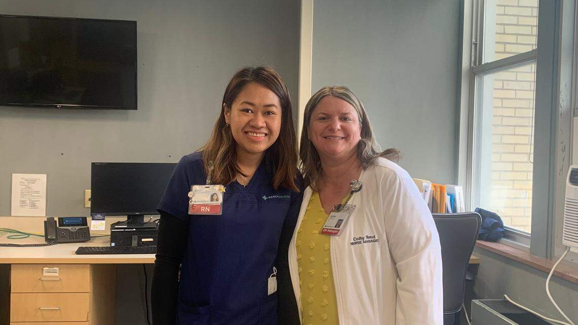 Kristel Syra Delos Santos (left) and nurse manager Cathy Ronci (right)