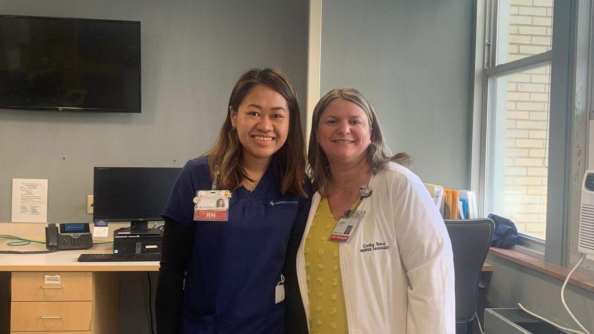 Kristel Syra Delos Santos (left) and nurse manager Cathy Ronci (right)