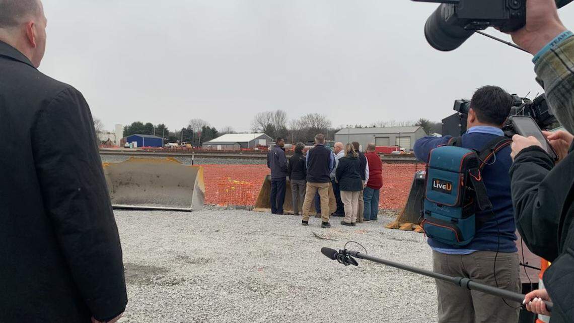President Biden walks the East Palestine train derailment site with town officials.
