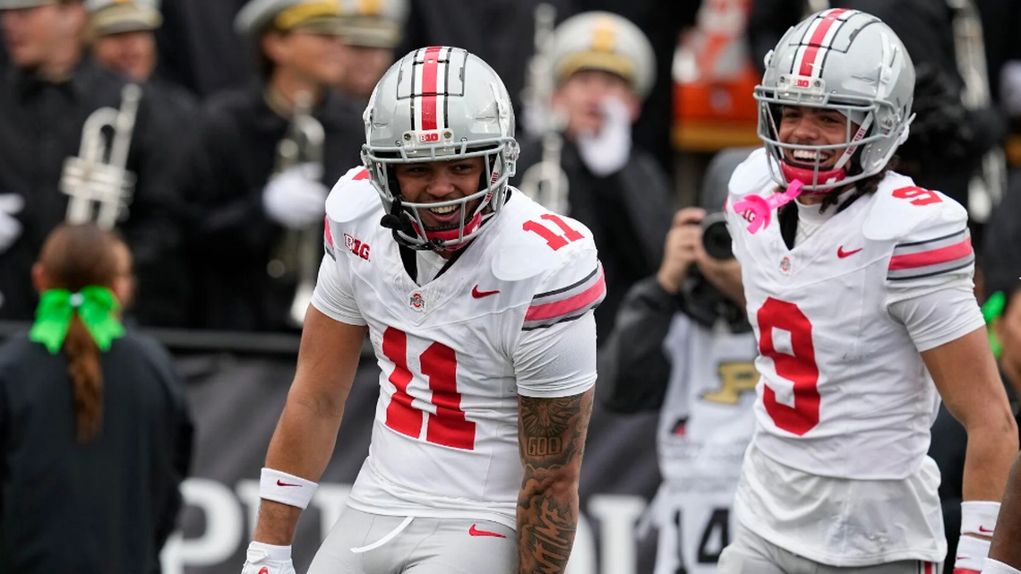Ohio State wide receiver Brandon Inniss (11) celebrates a touchdown reception with Jayden Ballard (9) during the second half of their game against Purdue on Saturday, Oct. 14, 2023.