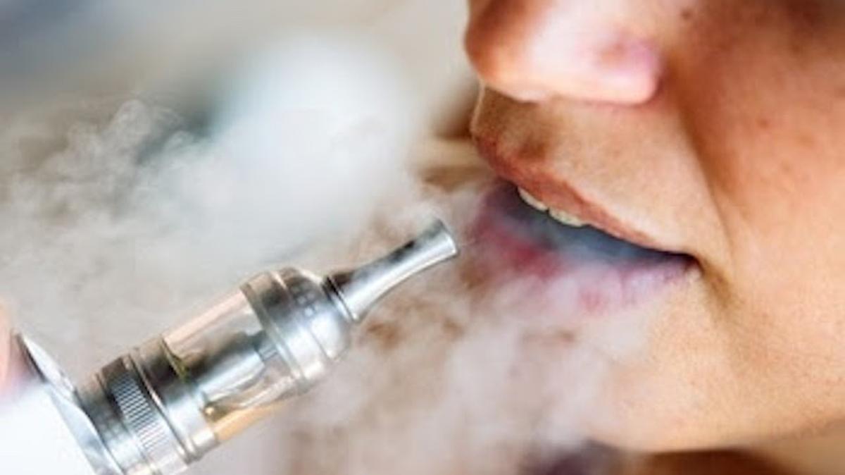 File photo of a person using a vaping device.