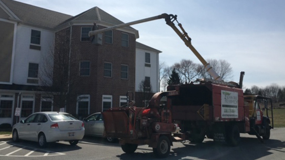 Charley Adams of Bessemer, Pa., on Sunday used his business' bucket truck to visit his 80-year-old mother at Windsor Estates Assisted Living in New Middletown, while access to the facility was restricted to protect against the spread of the new coronavirus, or COVID-19. (Submitted photo)