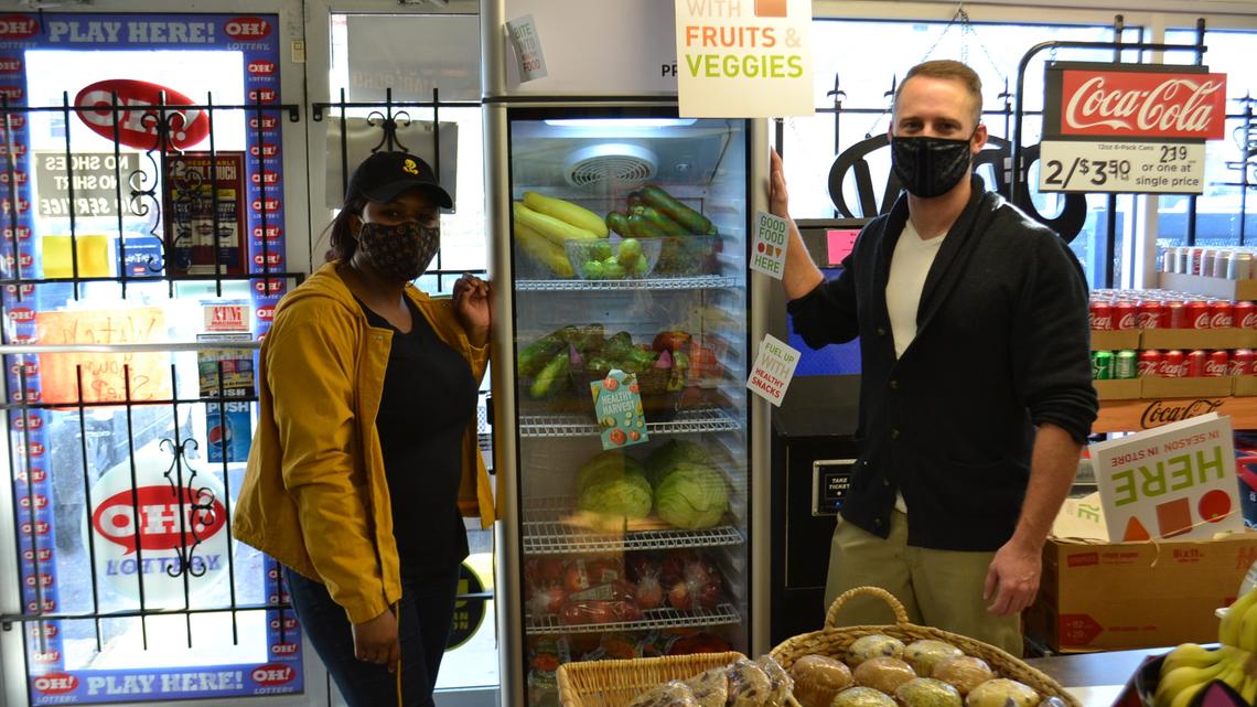 Christian Bennett-Mosley and Kris Kriebel Showcasing Fresh Produce at Cottage Market in Niles in Fall 2020