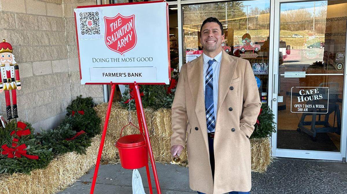 Roughly 80 Farmers National Bank in Canfield staff members braved the cold all day to ring the bells and raise money at the Salvation Army’s famous red-kettles.