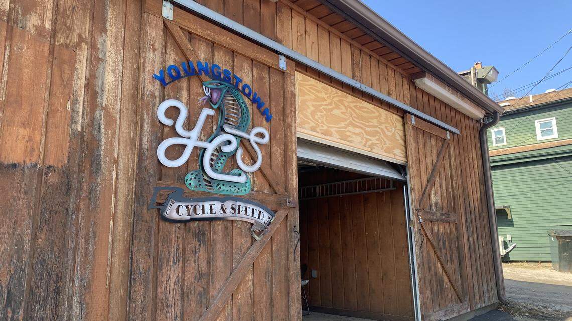 Owner adding custom flair to motorcycles, Jeeps at shop in Lisbon