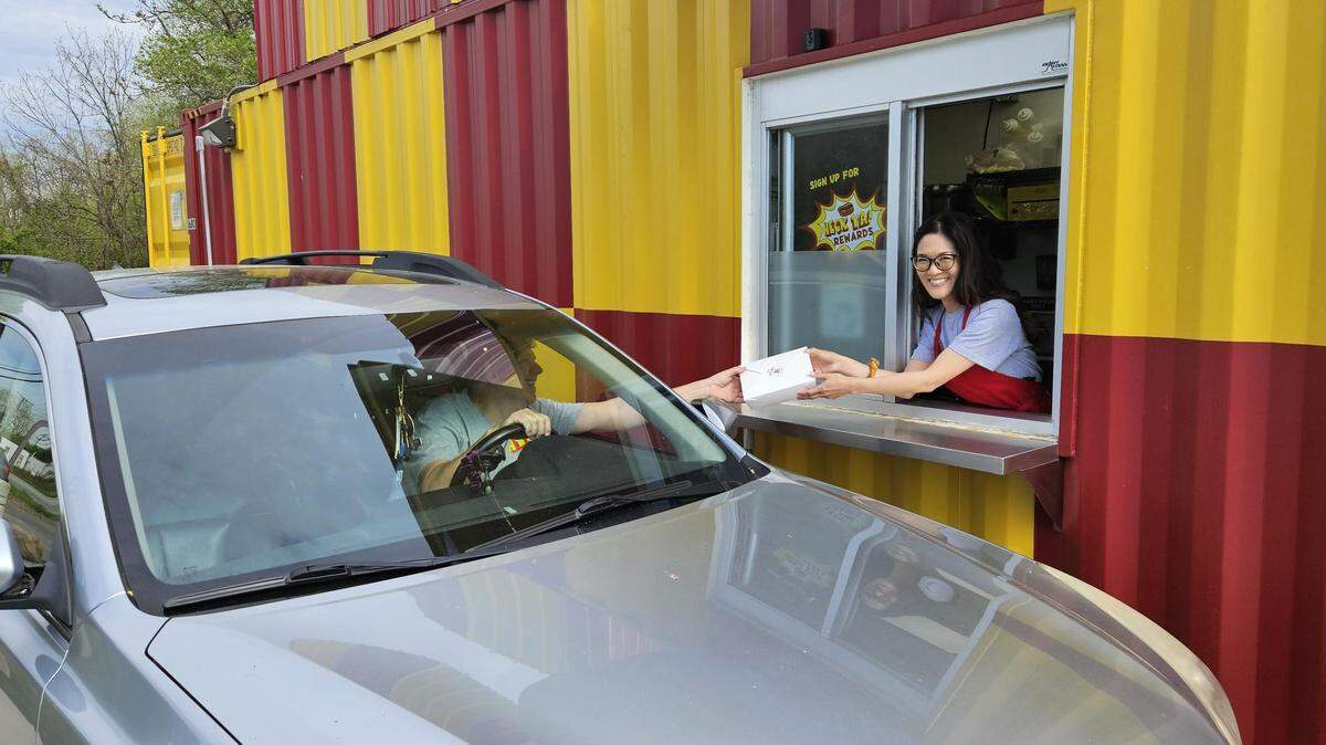 At Heck Ya!, family-owned business is now serving chili dogs from a re-purposed shipping container to Youngstown guests craving dinner on the go. 