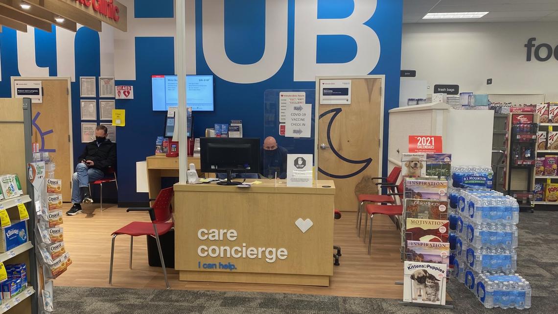 People who have just been vaccinated wait at the Minute Clinic inside CVS. 