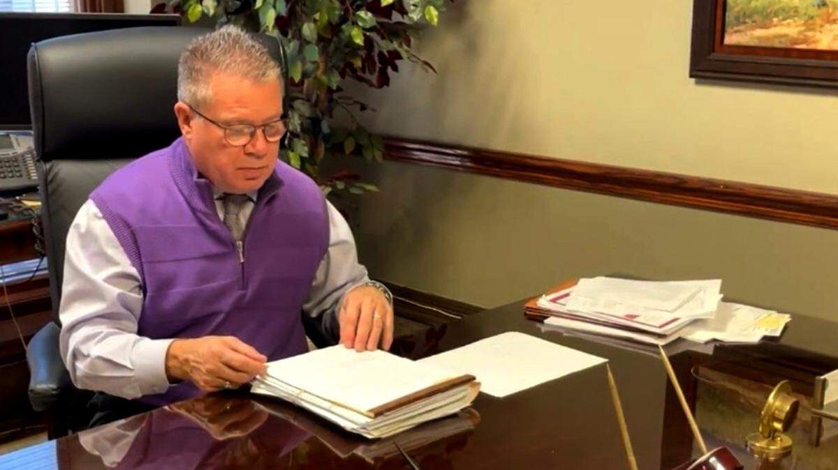 Mahoning County Common Pleas Court Judge John Durkin, also the county’s drug court judge, reviews files at the Mahoning County Courthouse.