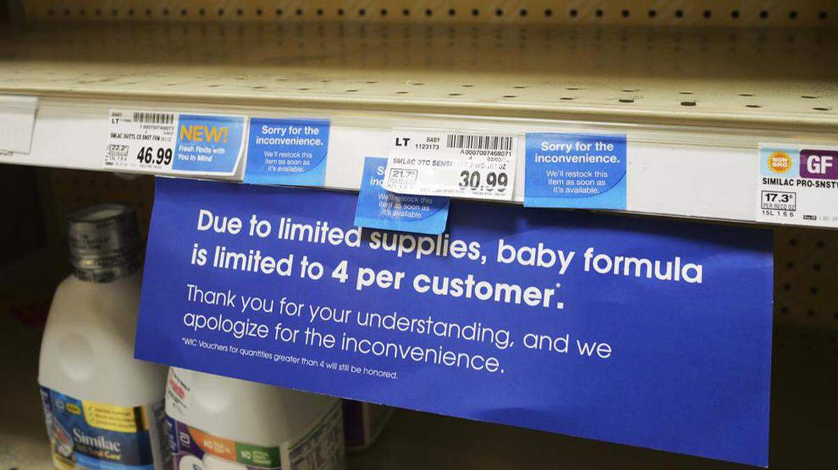 A due to limited supplies sign is shown on the baby formula shelf at a grocery store Tuesday in Salt Lake City. Parents across much of the U.S. are scrambling to find baby formula after a combination of supply disruptions and safety recalls have swept many of the leading brands off store shelves.